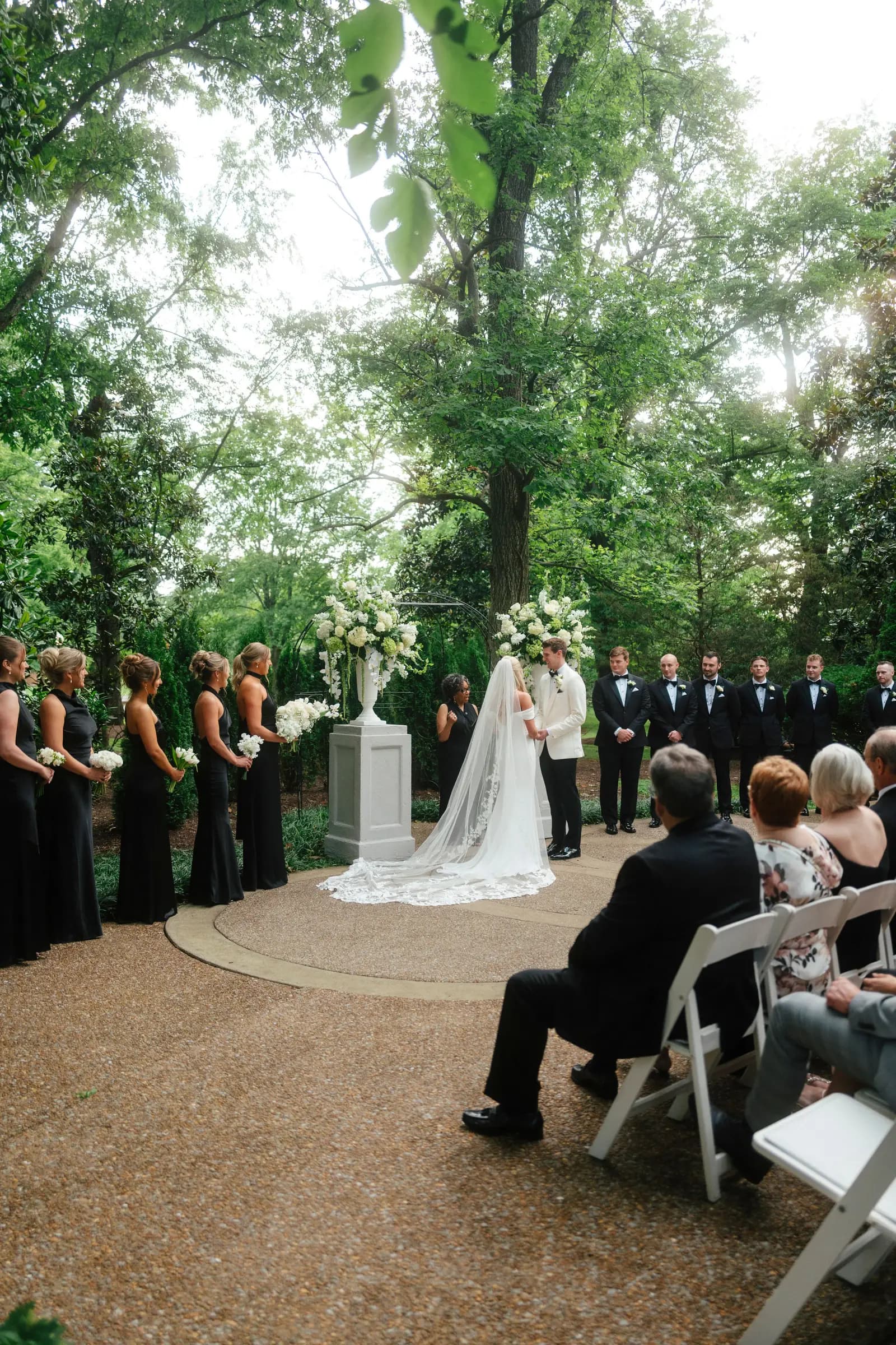 Garden wedding ceremony at a Nashville estate with the bride at the altar